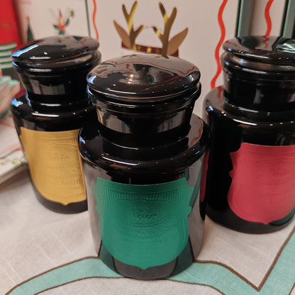 Black Apothecary Jar gold label. Scent of Palo Santo