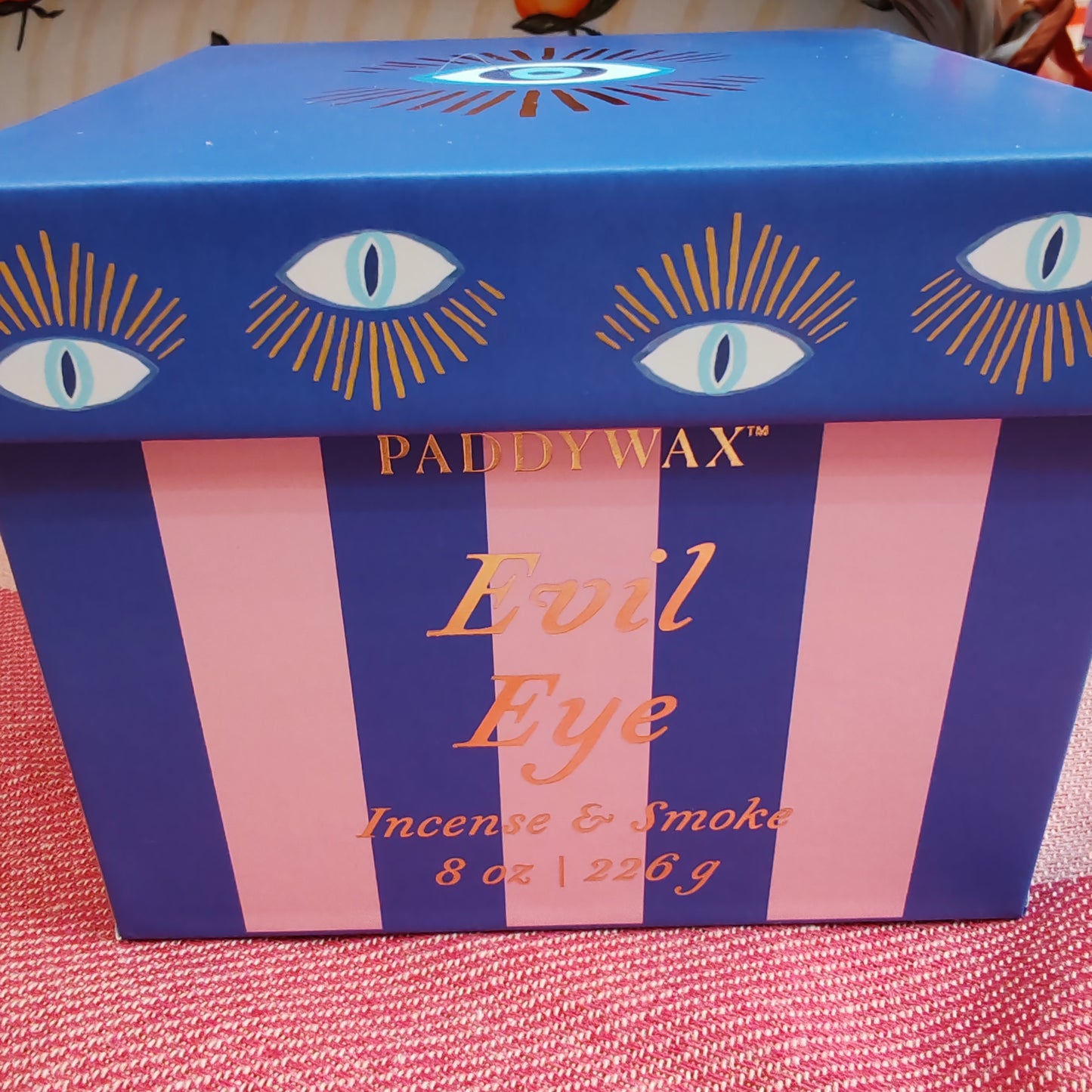 Evil eye scented candle in ceramic and glass repurposable pot