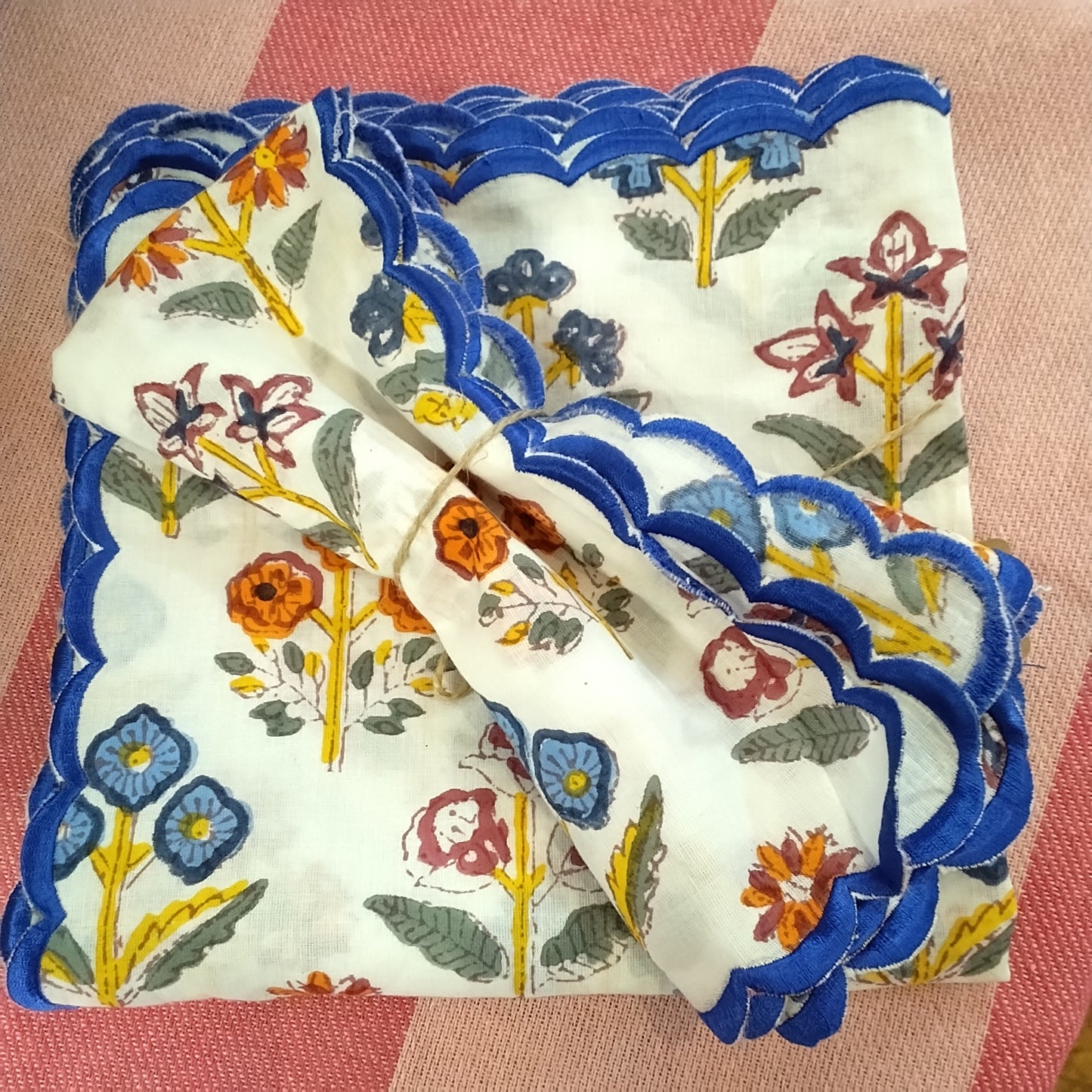 White floral napkins with blue trim (pair)