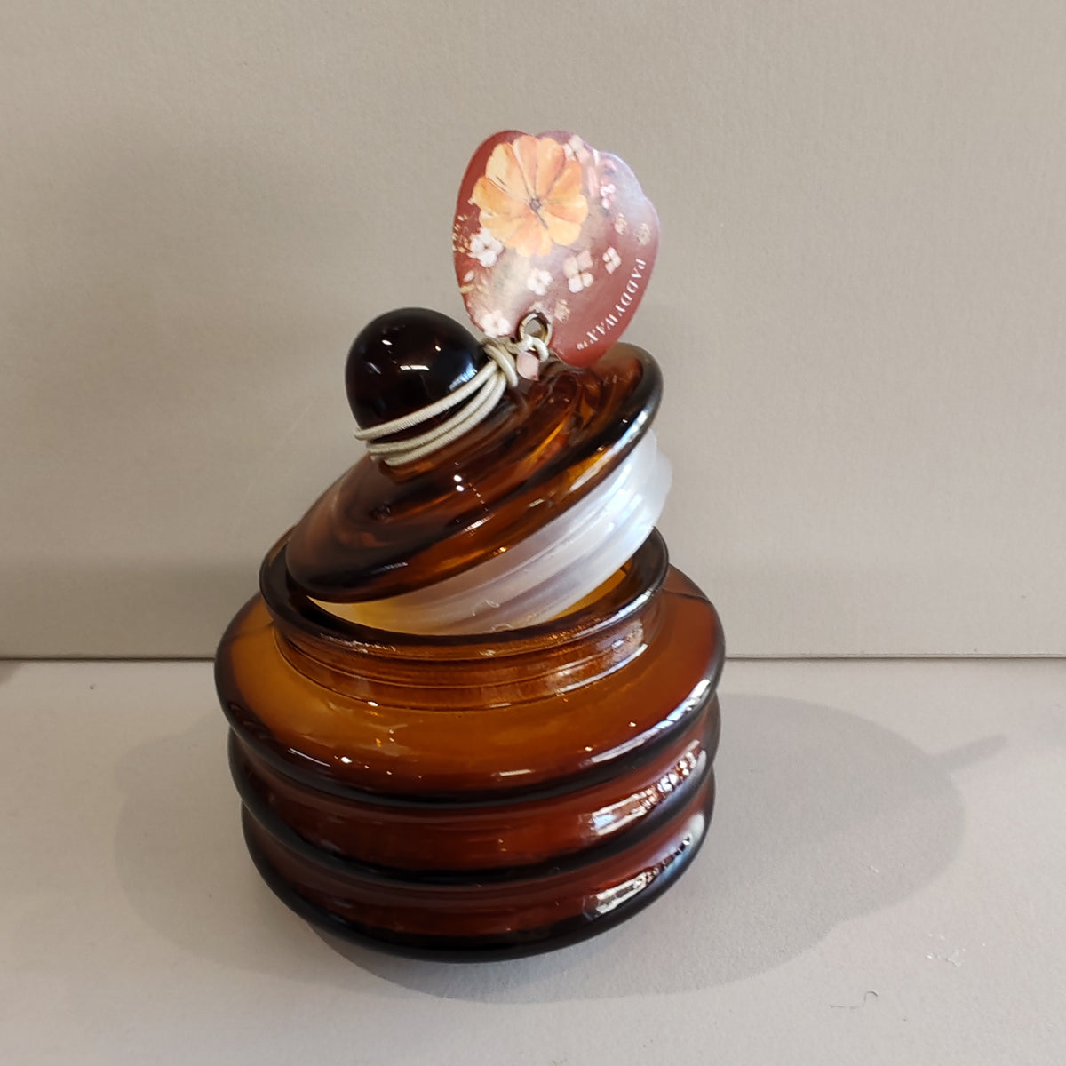 Pumpkin spice mini glass jar candle.
