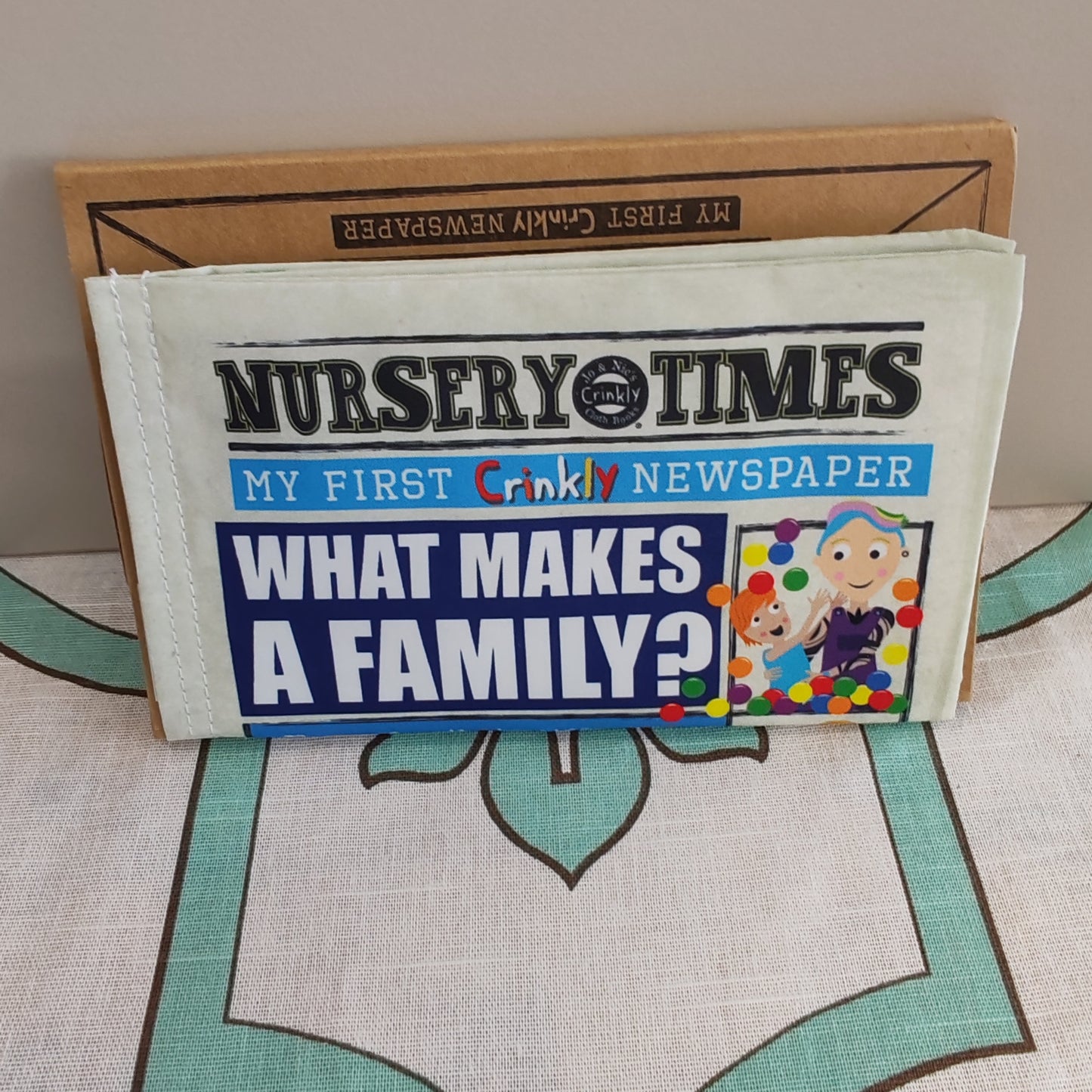 Crinkly sensory first cloth book - what makes a family
