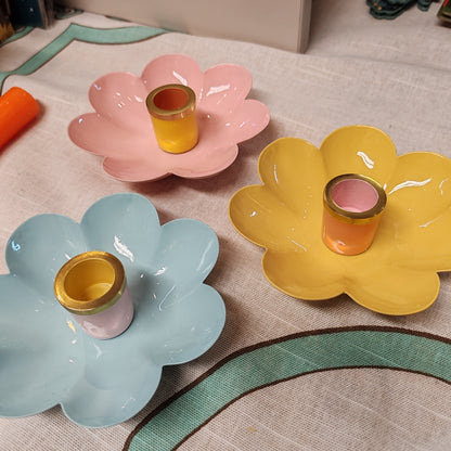 Enamel metal flower candle holder.