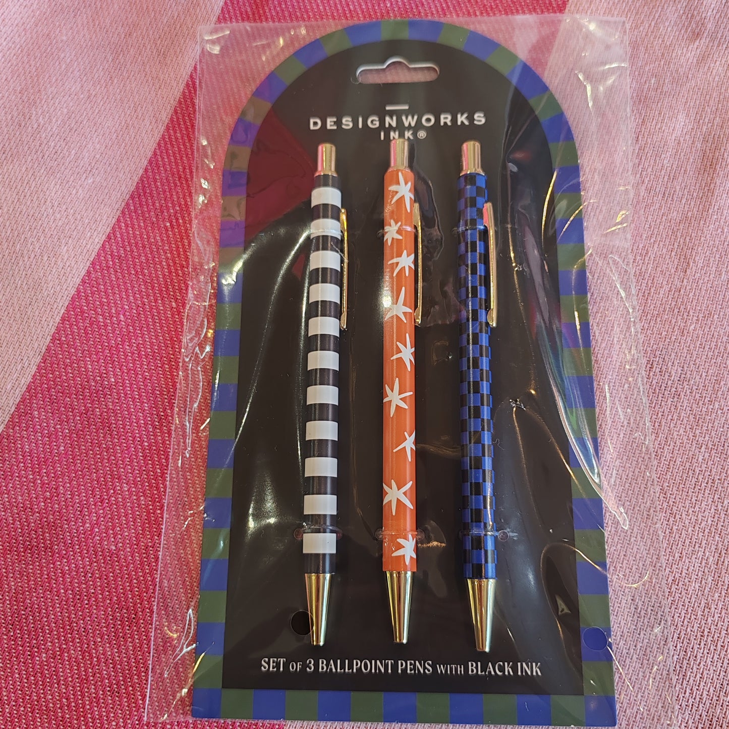 Set of 3 ballpoint pens. Stripe, check and star designs.