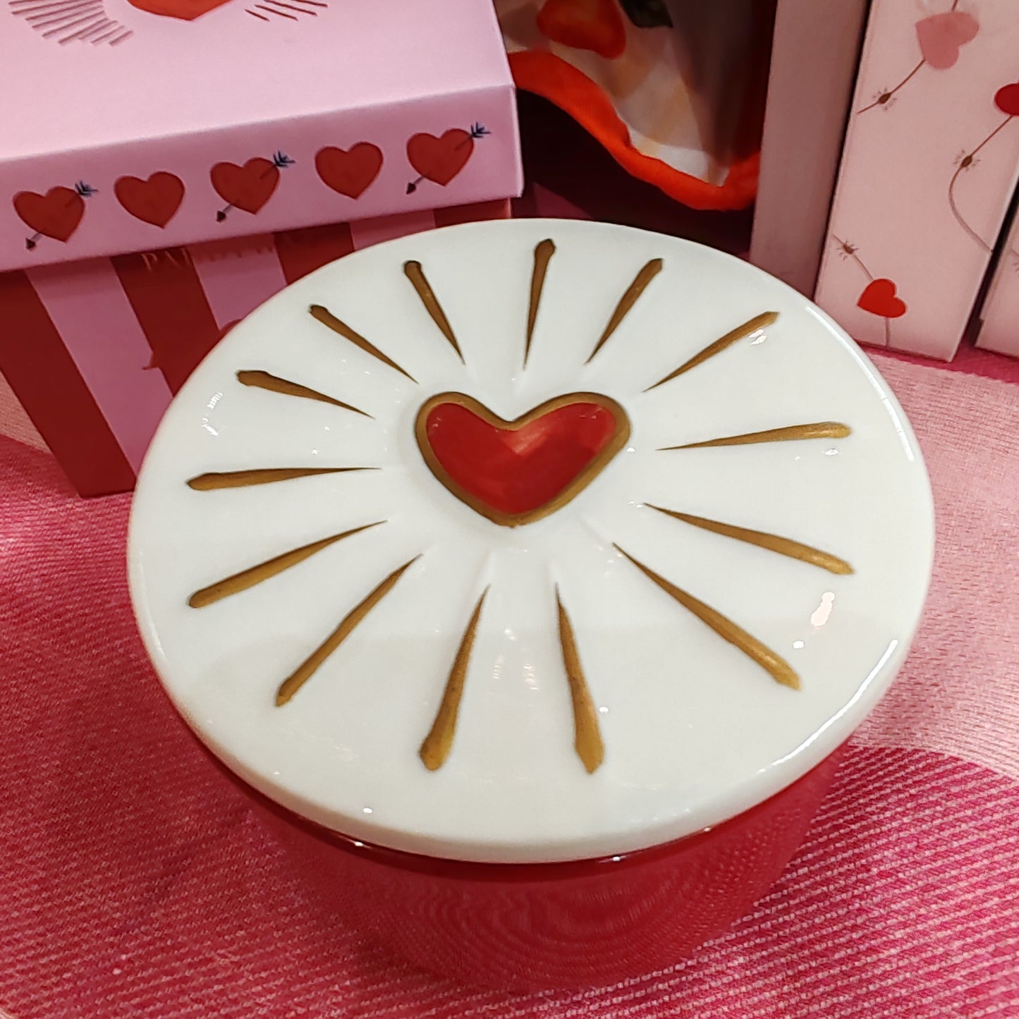 Ceramic and glass heart candle.