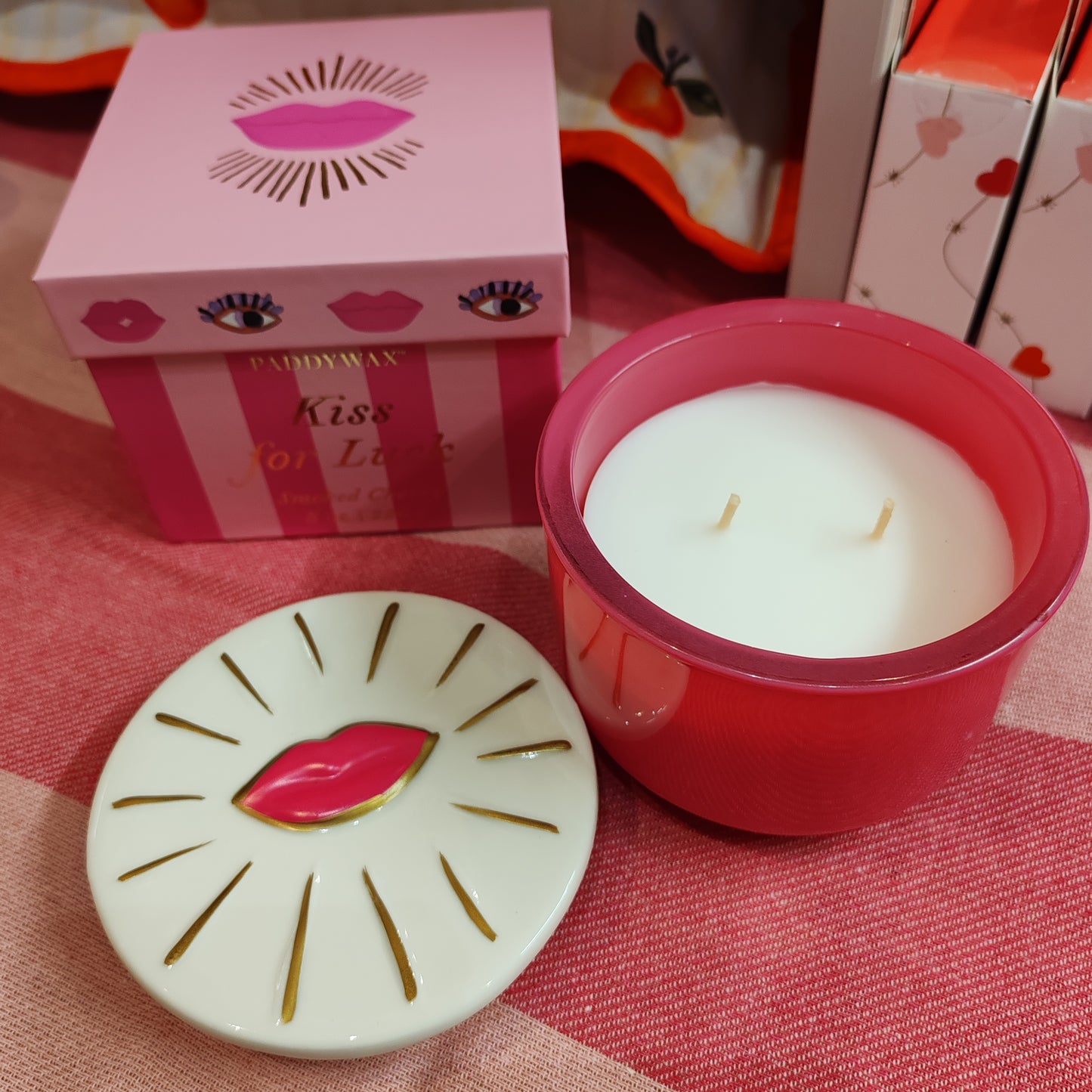 Kiss for luck candle in ceramic and glass repurposable pot.